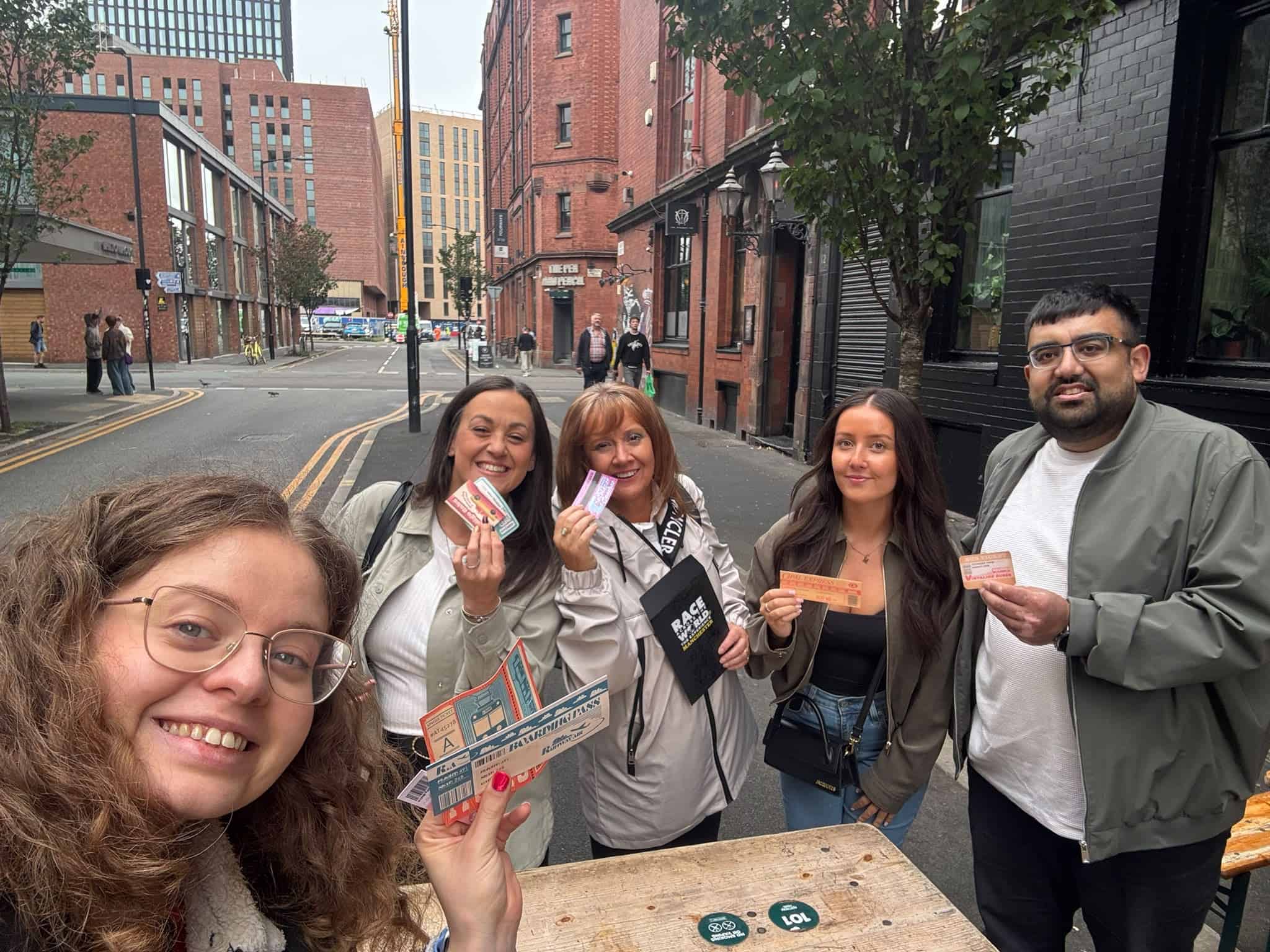 Five KBA team members taking part in a Manchester City challenge